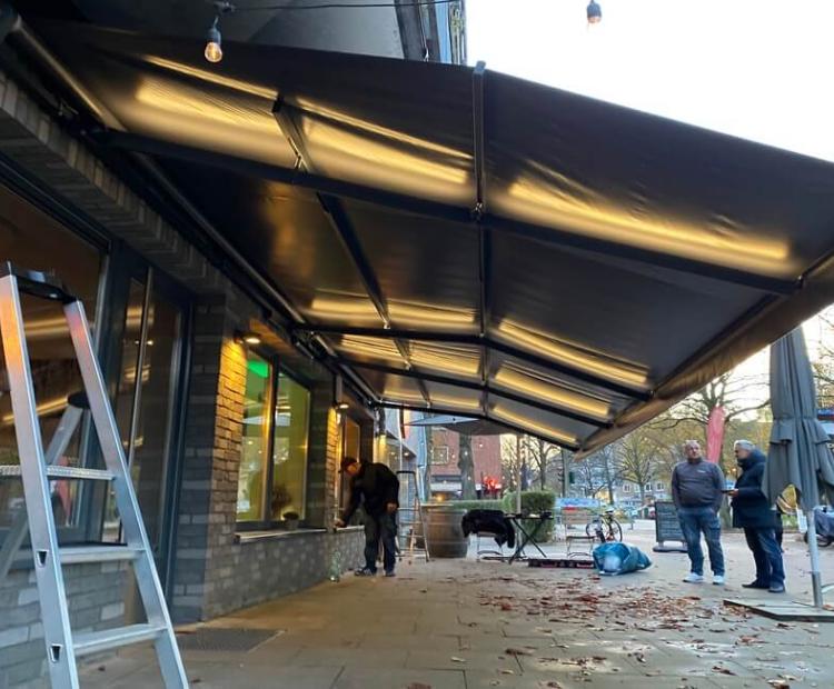 Sunrain-Markise-Hamburg-Pizzamacher